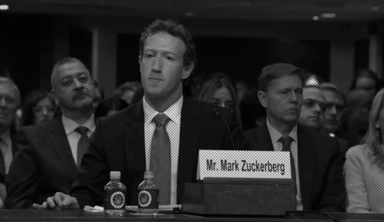 A desk lamp designed by Edouard Wilfrid Buquet in 1925. It features a double-arm design and is made from nickel-plated brass, aluminium and varnished wood.